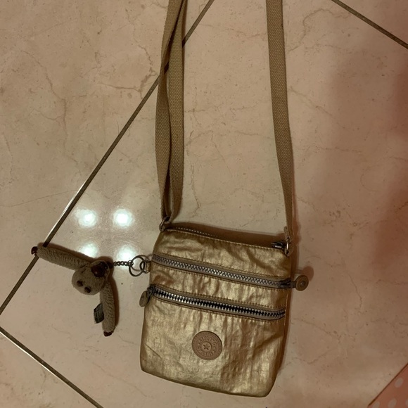 Kipling Bags Gold Kipling Side Bag Poshmark